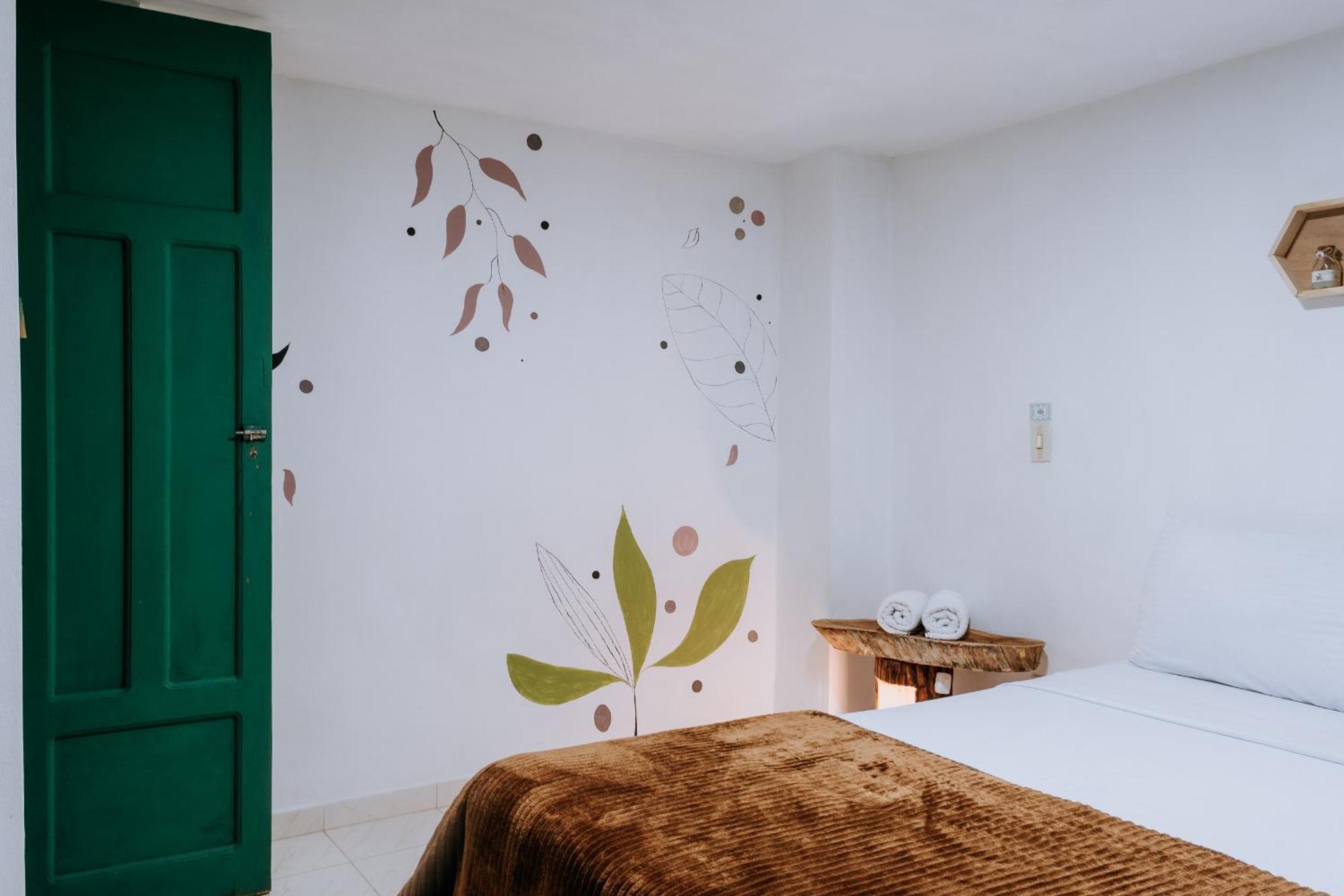 Origen Hostel Jardín Zewnętrze zdjęcie